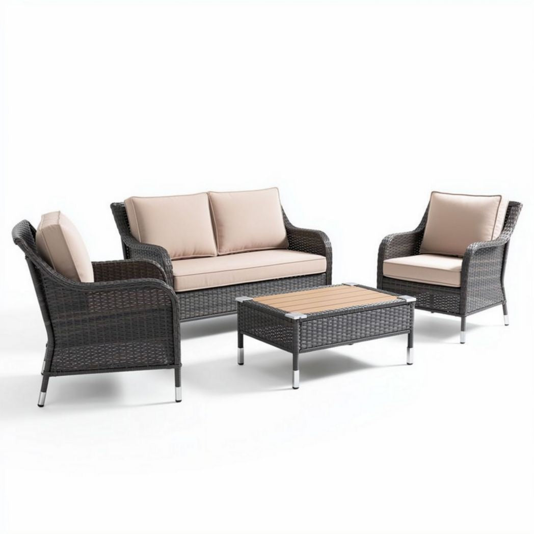 Outdoor wicker patio furniture set with beige cushions and glass table